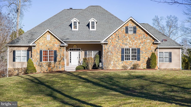 view of front of home with a front yard