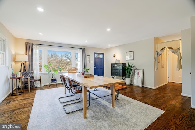 dining area featuring dark hardwood / wood-style flooring