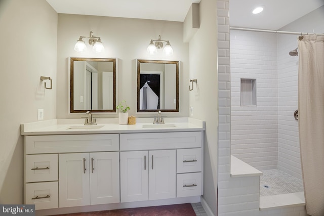 bathroom with vanity and walk in shower