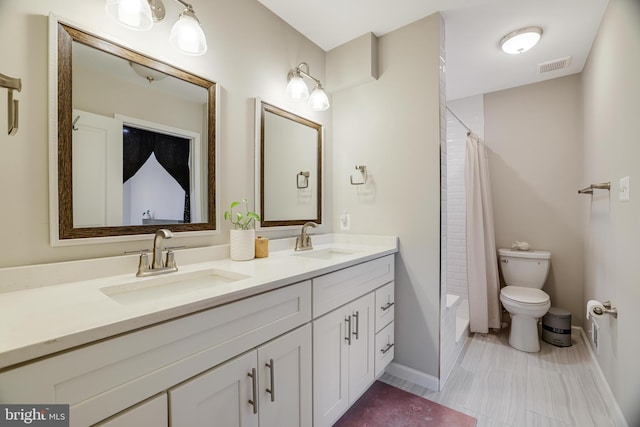 full bathroom with toilet, vanity, and shower / bathtub combination with curtain