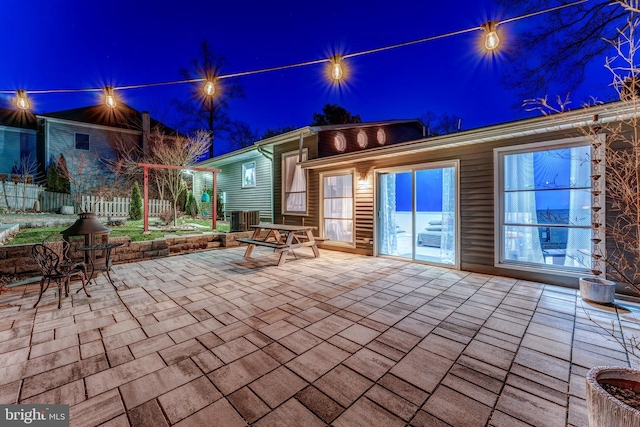 view of patio at twilight