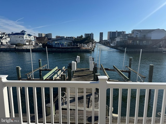 dock area with a water view