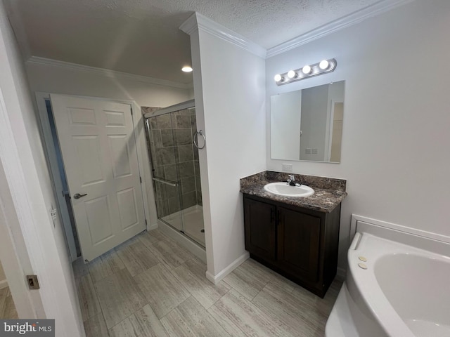 1355 Connecticut Ave, Hagerstown, MD 21740 - full bath featuring a textured ceiling, a shower stall, ornamental molding, vanity, and a garden tub