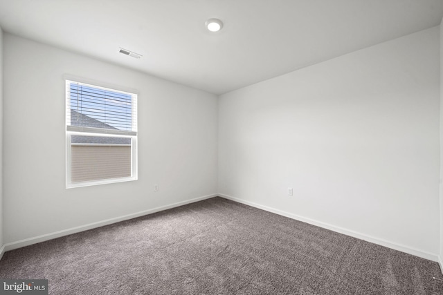 empty room featuring carpet