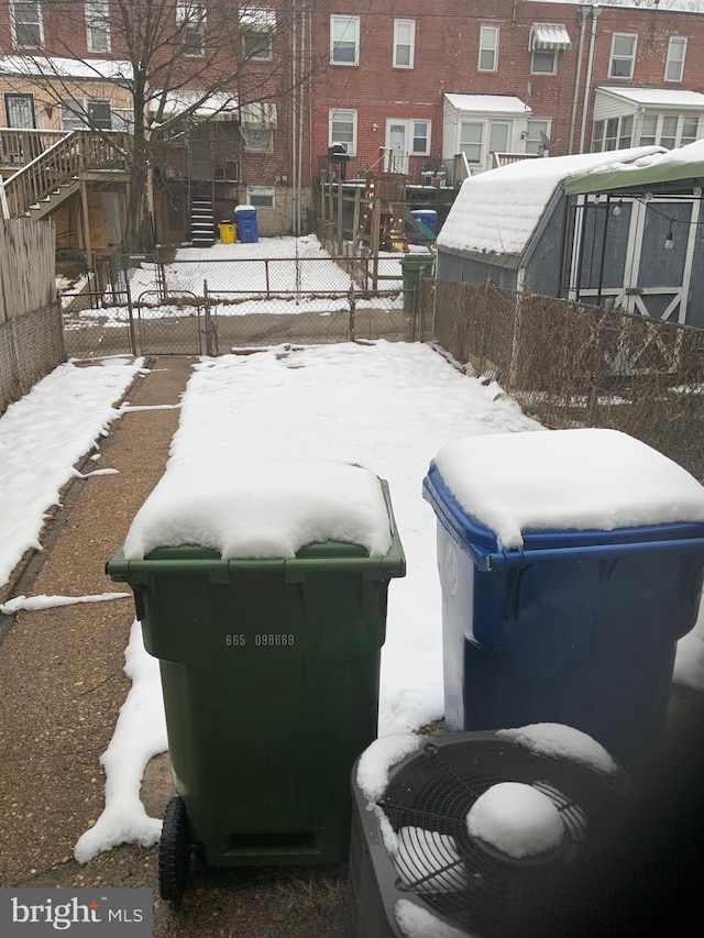 view of yard covered in snow