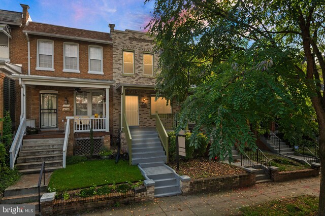 multi unit property featuring a porch