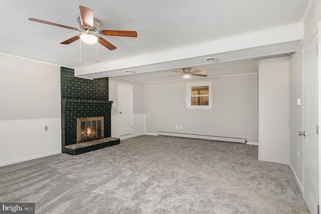 unfurnished living room featuring a baseboard heating unit, a textured ceiling, a brick fireplace, and carpet