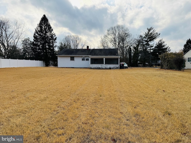 exterior space featuring a front yard