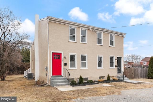 view of front of property with central AC unit