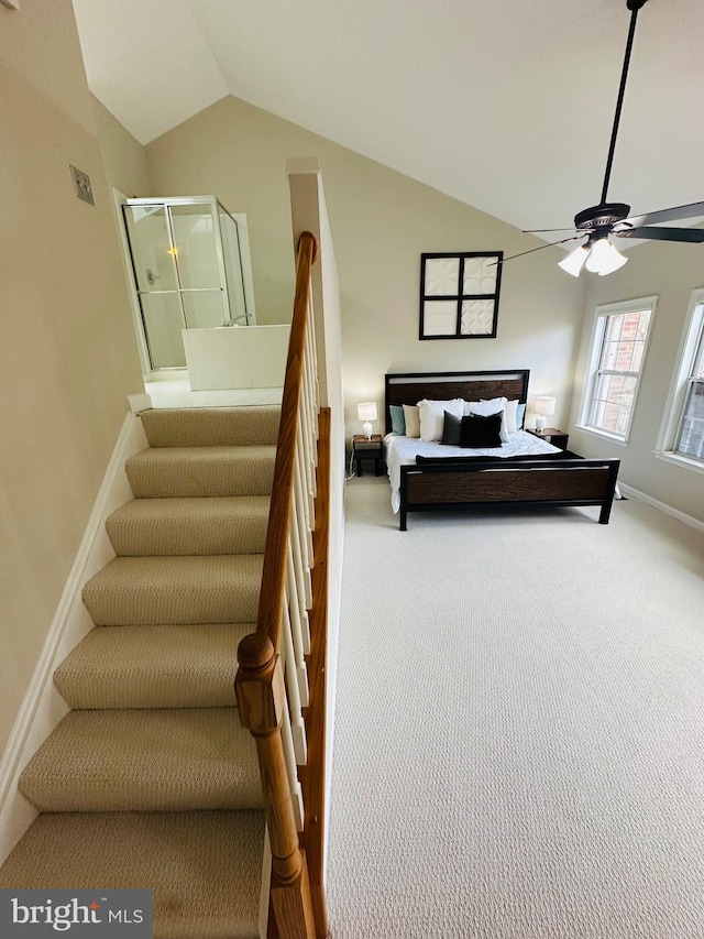 bedroom with lofted ceiling, baseboards, carpet floors, and ceiling fan