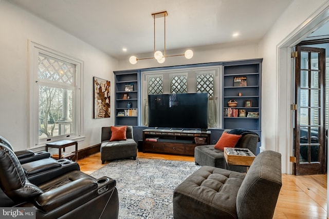 living room with light hardwood / wood-style flooring