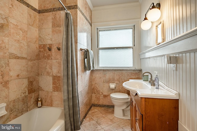 full bathroom featuring toilet, tile walls, crown molding, shower / bath combination with curtain, and vanity