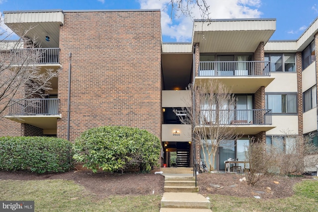 view of property with stairway