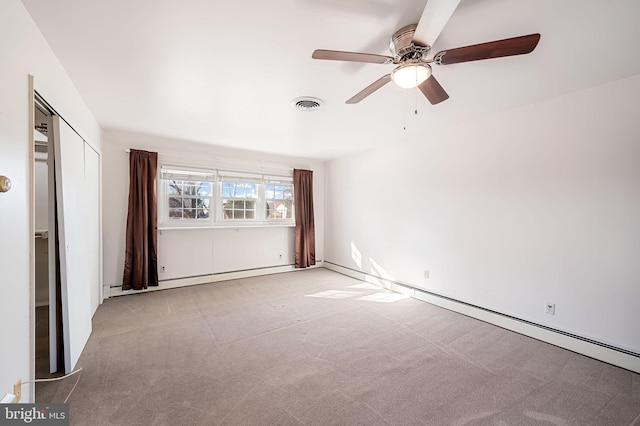 carpeted empty room featuring a baseboard radiator and ceiling fan