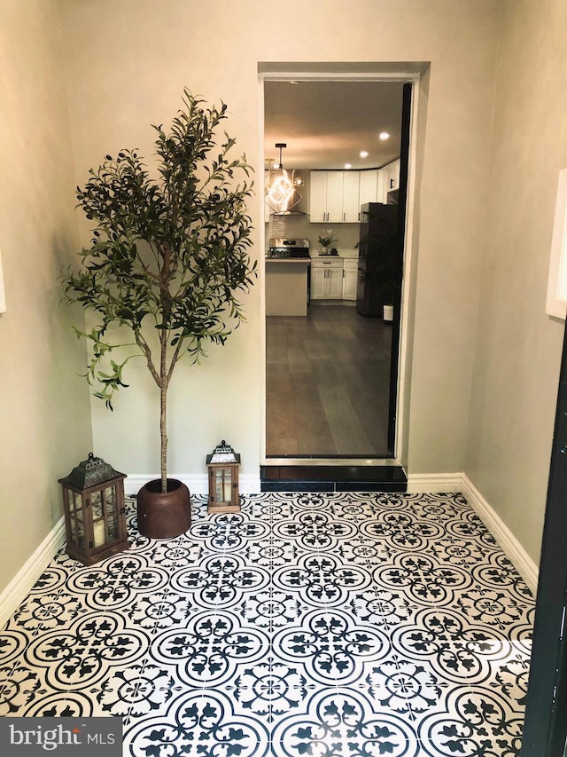 interior space featuring light tile patterned flooring