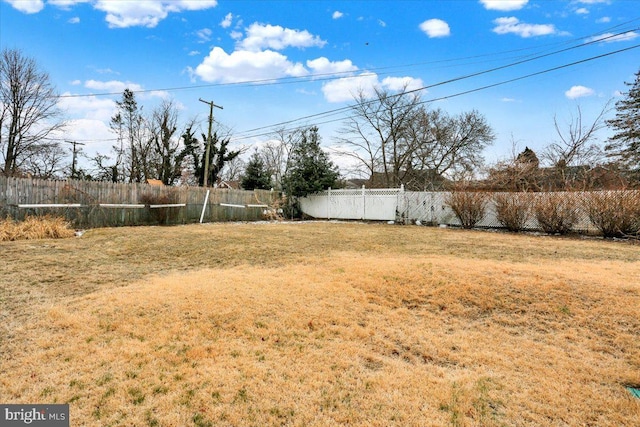 view of yard with fence