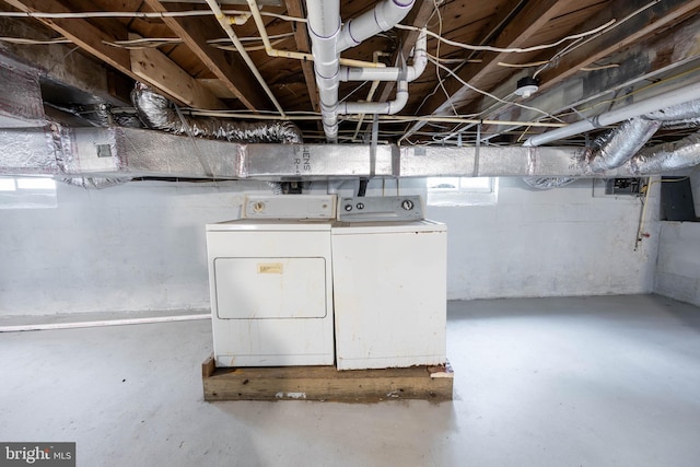 basement with washer and clothes dryer