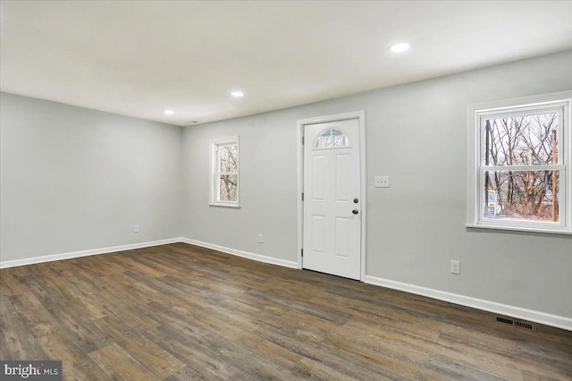 interior space with dark wood-type flooring