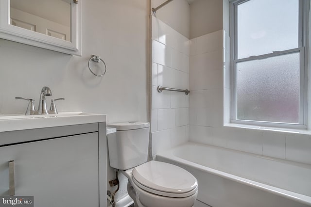 full bathroom with shower / tub combination, vanity, and toilet