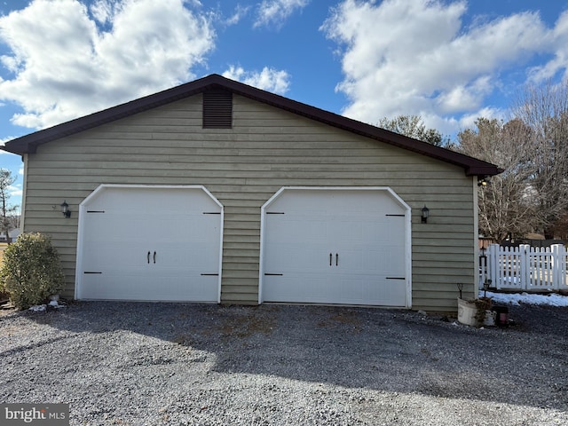 detached garage with fence