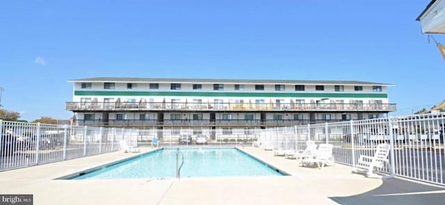 view of pool featuring a patio area