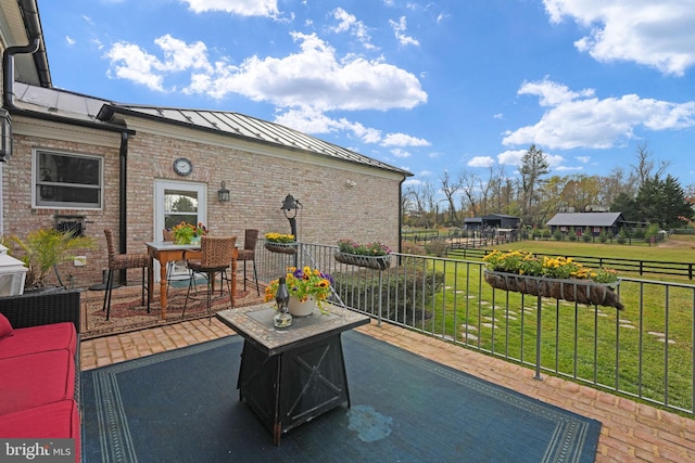 view of patio / terrace with fence