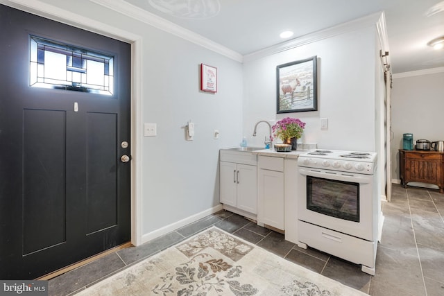 kitchen with electric range, a barn door, crown molding, white cabinetry, and a sink