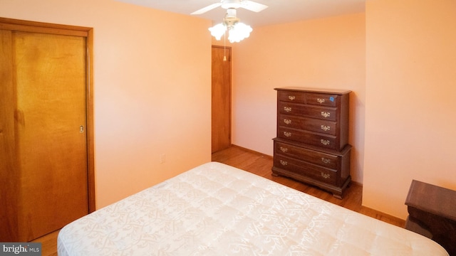 bedroom with wood finished floors