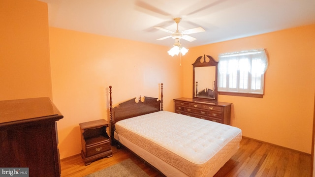 bedroom with wood finished floors and ceiling fan