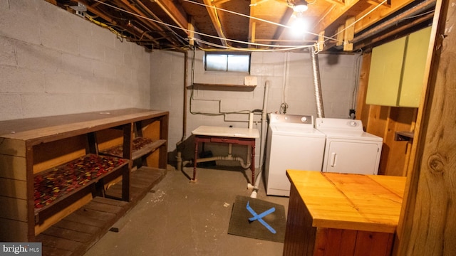 basement with washer and clothes dryer