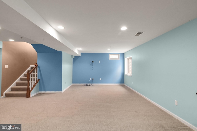 basement with light carpet