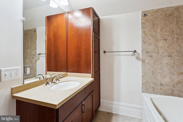bathroom with tile patterned floors and vanity