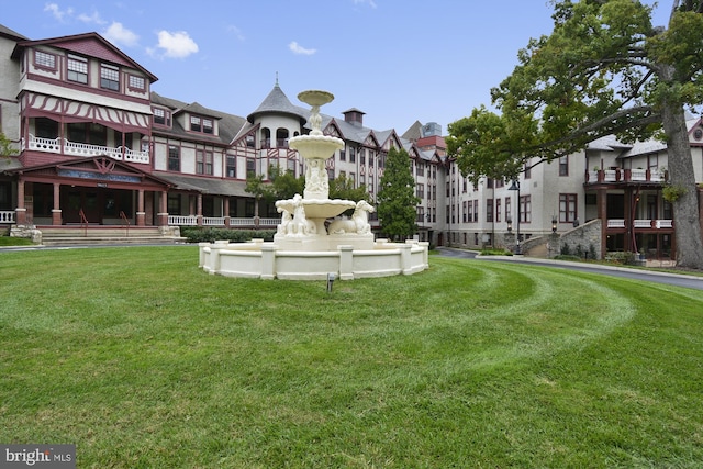 surrounding community with a lawn