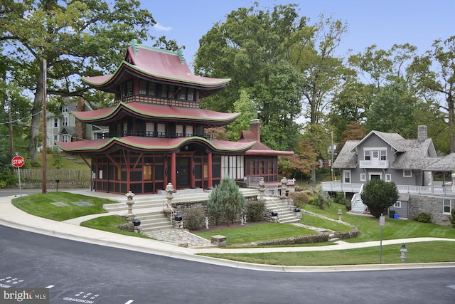 view of property featuring stairway
