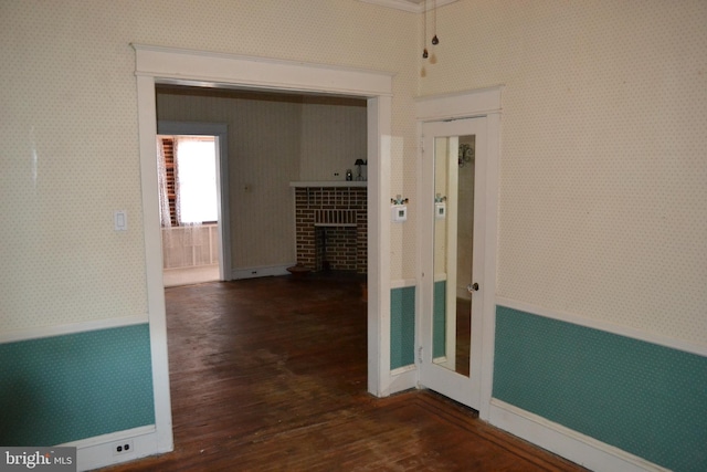 hall with dark hardwood / wood-style floors