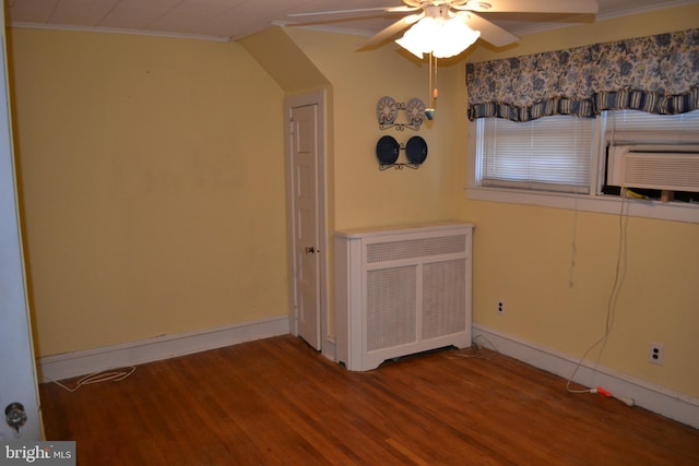 spare room featuring ornamental molding and hardwood / wood-style floors