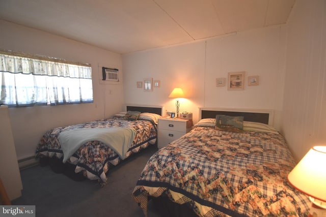 carpeted bedroom with a wall mounted air conditioner and a baseboard heating unit