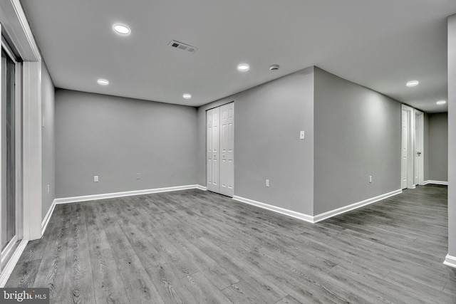 empty room with light wood-type flooring