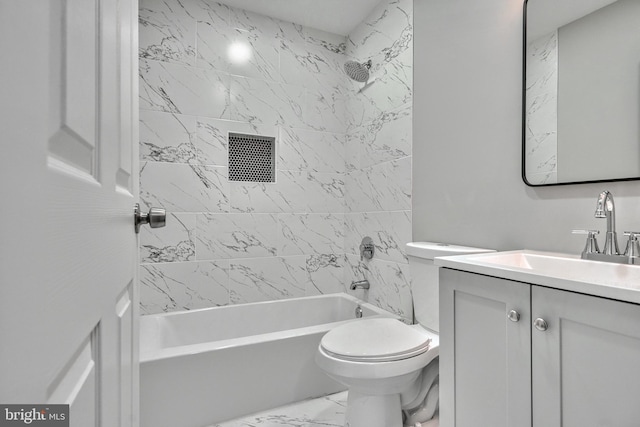 full bathroom featuring vanity, toilet, and tiled shower / bath combo