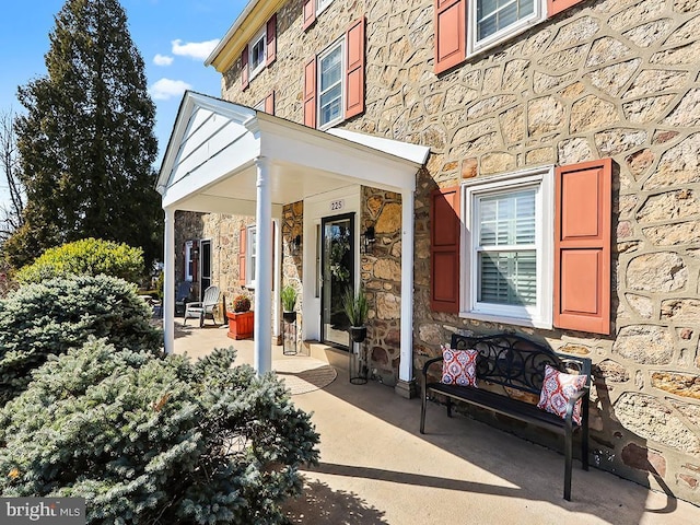 view of patio featuring a porch