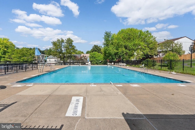 view of pool featuring a patio area