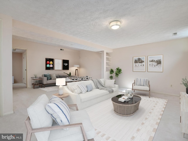 living area featuring visible vents, a textured ceiling, and light colored carpet