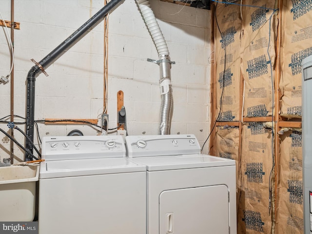 washroom with laundry area and separate washer and dryer