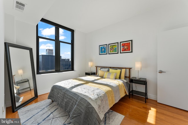 bedroom featuring light hardwood / wood-style flooring