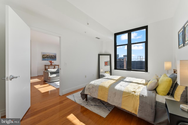 bedroom featuring hardwood / wood-style flooring