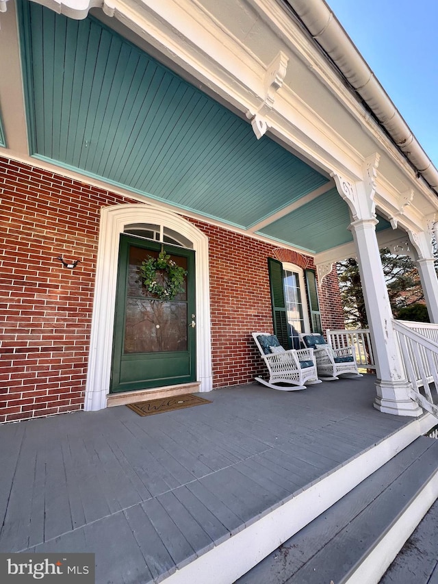 wooden terrace with covered porch