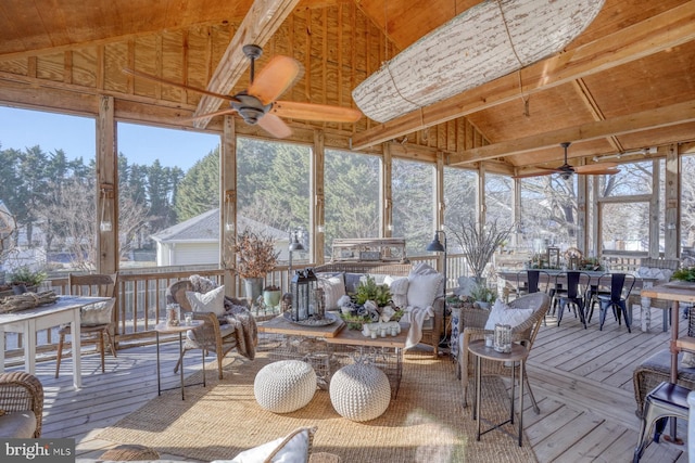 sunroom / solarium with ceiling fan and a healthy amount of sunlight