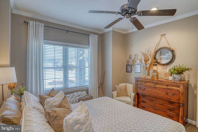 bedroom featuring ornamental molding and ceiling fan