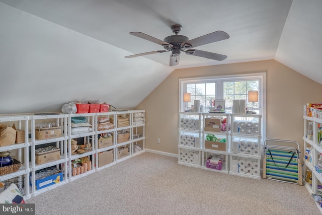 game room with lofted ceiling, ceiling fan, and carpet flooring