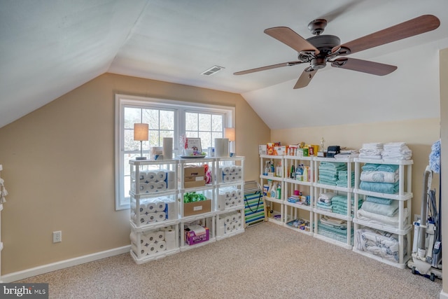 rec room featuring lofted ceiling and carpet floors